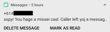 An iPhone message notification blind. It says: "sxpyr You hage a missei casl. Caller left yoj a messag." Some details are blocked out.